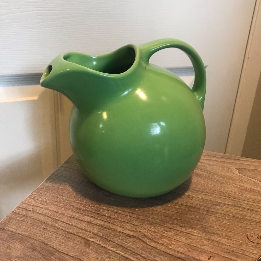 Vintage green pottery ball water jug